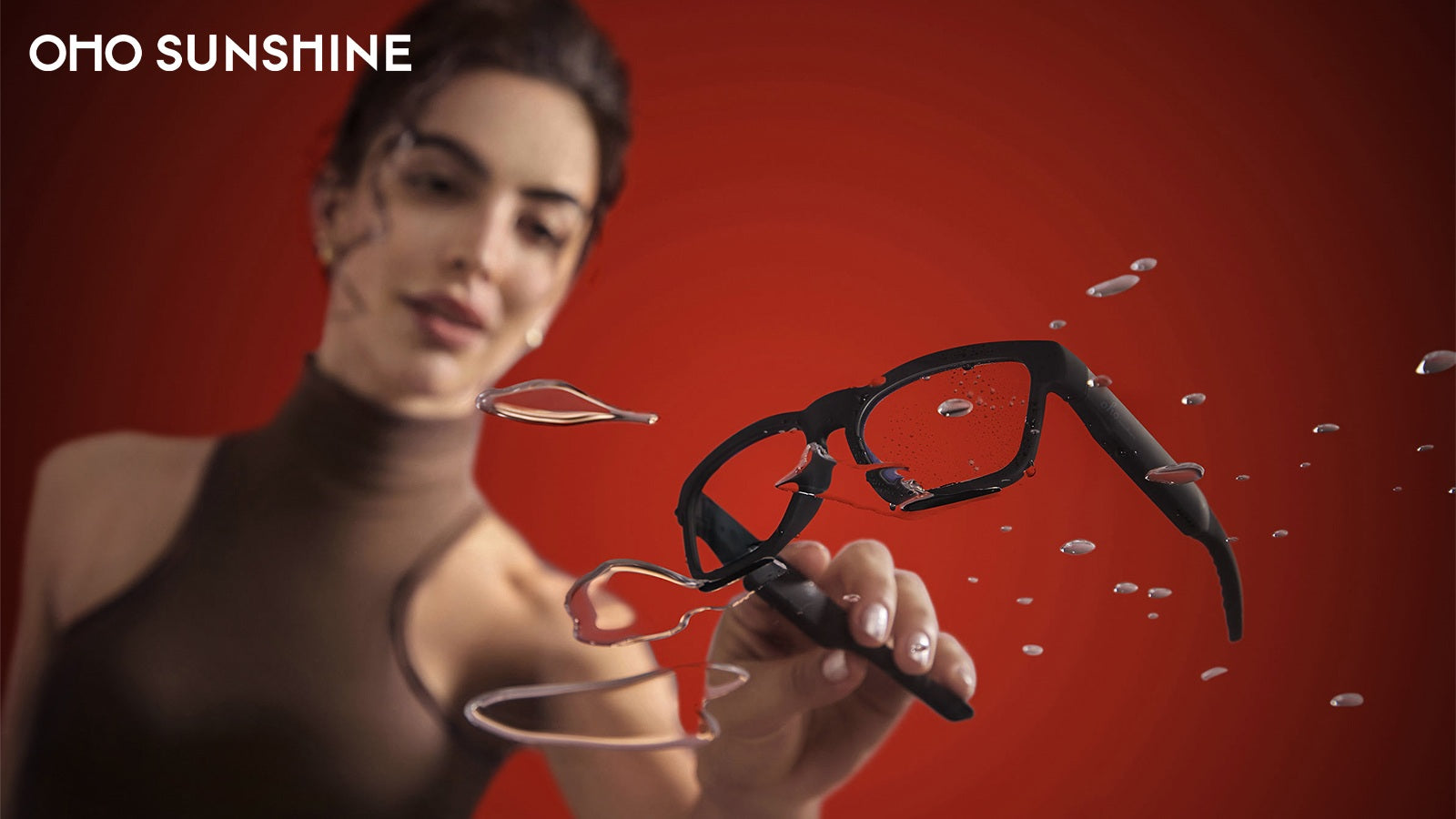  OHO Sunshine smart glasses displayed with floating water droplets to illustrate IPX4 water resistance and durability.